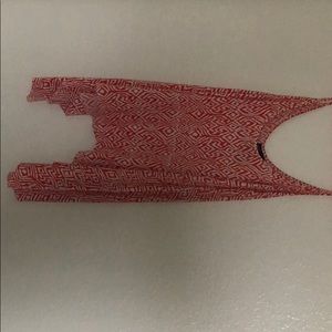 An orange and white top